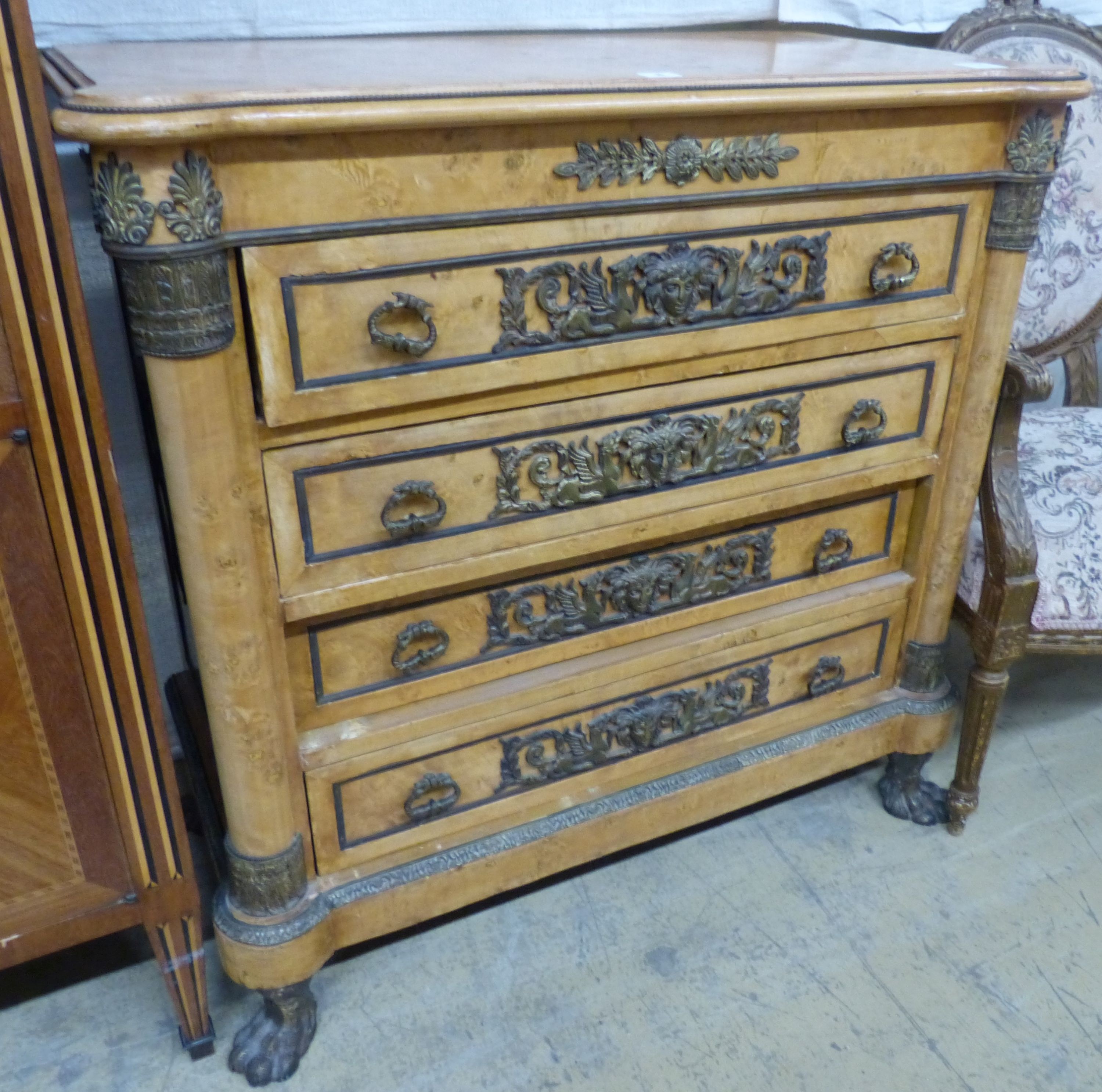 A French Empire style ormolu mounted walnut chest of drawers, W.90cm D.45cm H.89cm